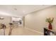 Open concept dining area with tile flooring and a view of the kitchen at 12413 Osorio Ct # 103, Sarasota, FL 34238