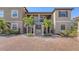 Two-story condo building with balconies and parking area at 12413 Osorio Ct # 103, Sarasota, FL 34238