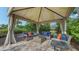 Relaxing outdoor gazebo with seating and shade at 12413 Osorio Ct # 103, Sarasota, FL 34238