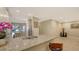 Modern kitchen with granite countertops and stainless steel appliances at 12413 Osorio Ct # 103, Sarasota, FL 34238