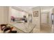 Kitchen with granite countertop island and breakfast bar at 12413 Osorio Ct # 103, Sarasota, FL 34238