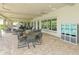 Outdoor patio area with tables and chairs at 12413 Osorio Ct # 103, Sarasota, FL 34238