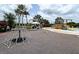 Modern playground with a climbing net and play area at 12413 Osorio Ct # 103, Sarasota, FL 34238