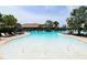 Large freeform swimming pool with water features at 12413 Osorio Ct # 103, Sarasota, FL 34238