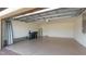 Spacious two-car garage with an automatic door, water heater and ample room for storage at 12651 Garibaldi Ln, Venice, FL 34293