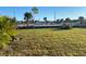 Large backyard with grassy area at 13457 Muriel Ave, Port Charlotte, FL 33981