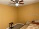 Simple bedroom with a wall-mounted TV and ample space at 13457 Muriel Ave, Port Charlotte, FL 33981