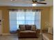 Comfortable living room showcasing a cozy seating arrangement at 13457 Muriel Ave, Port Charlotte, FL 33981