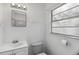 Simple bathroom with shower, toilet, and vanity at 1376 18Th St, Sarasota, FL 34234