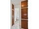 Clean bathroom with toilet, sink, and built-in cabinets at 1376 18Th St, Sarasota, FL 34234