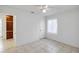 Spacious bedroom with tiled floors and ceiling fan at 1376 18Th St, Sarasota, FL 34234