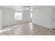 Bright bedroom with tiled floors and ceiling fan at 1376 18Th St, Sarasota, FL 34234