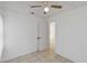 Bright bedroom with tiled floors and access to hallway at 1376 18Th St, Sarasota, FL 34234
