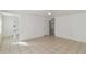 Open living area with tile floors and access to other rooms at 1376 18Th St, Sarasota, FL 34234