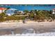 Elevated view of waterfront home with beach access and stunning ocean views at 1620 Casey Key Rd, Nokomis, FL 34275