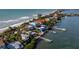 Luxury beachfront home with a private dock and stunning ocean views at 1620 Casey Key Rd, Nokomis, FL 34275