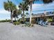 Beachfront home with palm trees and a relaxing patio area at 1620 Casey Key Rd, Nokomis, FL 34275