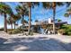 Charming beach cottage with tropical landscaping and a relaxing patio area at 1620 Casey Key Rd, Nokomis, FL 34275