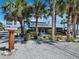 Front yard view of beach house with tropical landscaping at 1620 Casey Key Rd, Nokomis, FL 34275