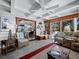 Open and airy living room with a view into the dining area and backyard at 1620 Casey Key Rd, Nokomis, FL 34275