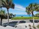 Ocean view from property, palm trees and road at 1620 Casey Key Rd, Nokomis, FL 34275