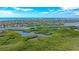 Aerial view of waterfront community and lush landscape at 1620 Starling Dr # 204, Sarasota, FL 34231