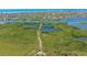 Aerial view of mangrove waterways and neighborhood at 1620 Starling Dr # 204, Sarasota, FL 34231
