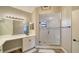 Modern bathroom with a walk-in shower and updated vanity at 1620 Starling Dr # 204, Sarasota, FL 34231