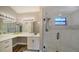 Modern bathroom with a walk-in shower and updated vanity at 1620 Starling Dr # 204, Sarasota, FL 34231
