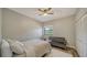 Bright bedroom with a comfortable bed and a small sofa at 1620 Starling Dr # 204, Sarasota, FL 34231