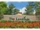 The Landings community entrance with landscaping at 1620 Starling Dr # 204, Sarasota, FL 34231