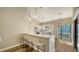 Modern kitchen with stainless steel appliances and white cabinetry at 1620 Starling Dr # 204, Sarasota, FL 34231