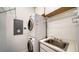 Convenient laundry room with washer, dryer, and sink at 1620 Starling Dr # 204, Sarasota, FL 34231