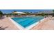 Inviting community pool with ample deck space at 1620 Starling Dr # 204, Sarasota, FL 34231