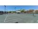 Well-maintained tennis courts with ample lighting and seating at 1620 Starling Dr # 204, Sarasota, FL 34231