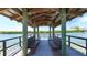 Relaxing waterfront pavilion with benches, offering scenic views at 1620 Starling Dr # 204, Sarasota, FL 34231