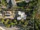 Aerial view of the property showcasing the building's architectural details and surrounding landscape at 1695 Lowe Dr, Sarasota, FL 34236
