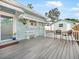 Spacious back patio with composite decking, seating area, and access to the backyard at 1812 7Th W Ave, Bradenton, FL 34205