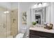 Bathroom with a frameless shower and modern vanity at 192 Van Gogh Cv, Bradenton, FL 34212
