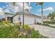 Two-car garage home with landscaped yard and paver driveway at 192 Van Gogh Cv, Bradenton, FL 34212