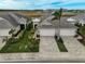 Luxury villas with two-car garages and well-manicured landscaping at 192 Van Gogh Cv, Bradenton, FL 34212