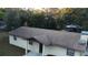 Single story home with a large backyard and satellite dish at 219 E Early St, Brooksville, FL 34601
