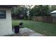 Spacious backyard with a patio and grassy area at 219 E Early St, Brooksville, FL 34601