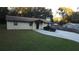 Single story home with a carport and spacious yard at 219 E Early St, Brooksville, FL 34601