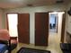Hallway with doors to other rooms and carpet flooring at 219 E Early St, Brooksville, FL 34601