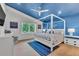Main bedroom with vaulted ceiling, and coastal decor at 2208 Avenue A, Bradenton Beach, FL 34217