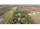 Spacious property with two homes and multiple outbuildings at 39200 Cook Brown Rd, Punta Gorda, FL 33982