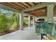 Unfinished basement area with car parking and plenty of storage at 39200 Cook Brown Rd, Punta Gorda, FL 33982