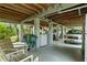 Unfinished basement with space for cars, laundry, and storage at 39200 Cook Brown Rd, Punta Gorda, FL 33982