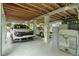 Unfinished basement with car parking and extra storage space at 39200 Cook Brown Rd, Punta Gorda, FL 33982